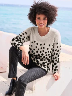Pull jacquard motif à pois tendance