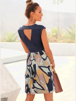 Robe d'été robe en jersey dos nu avec jupe à motifs