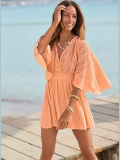 Robe tunique col v chevauchant