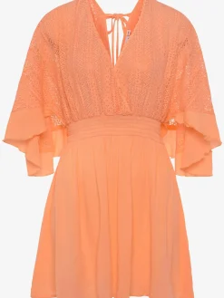 Robe tunique col v chevauchant