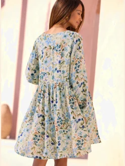 Robe tunique encolure en v profonde avec ruban décoratif et houppes