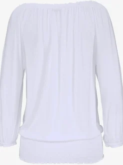 Se porte comme un t-shirt carmen ou sur les épaules