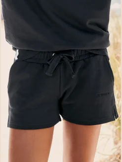 Short en matière sweat short d'intérieur avec logo brodé