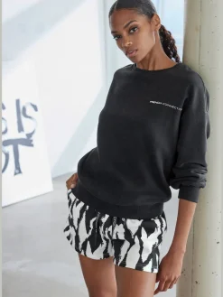 Short en matière sweat short molletonné confortable avec imprimé sur toute la surface