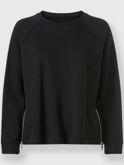 Sweatshirt extensible grâce aux glissières latérales