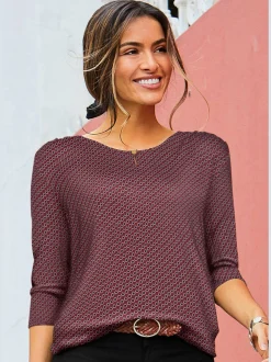 T-shirt à col rond encolure ronde avec petite ouverture et bouton doré devant