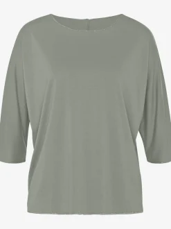 T-shirt à col rond finitions pailletées raffinées à l'encolure ronde, aux manches et à l'ourlet