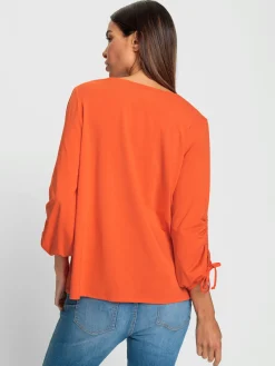 T-shirt à encolure ronde manches raffinées avec fente et liens à nouer