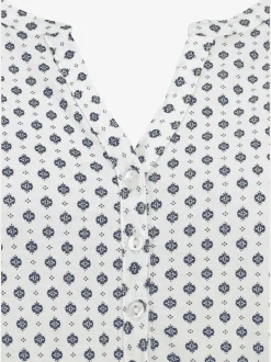 T-shirt patte de boutonnage avec boutons légèrement brillants