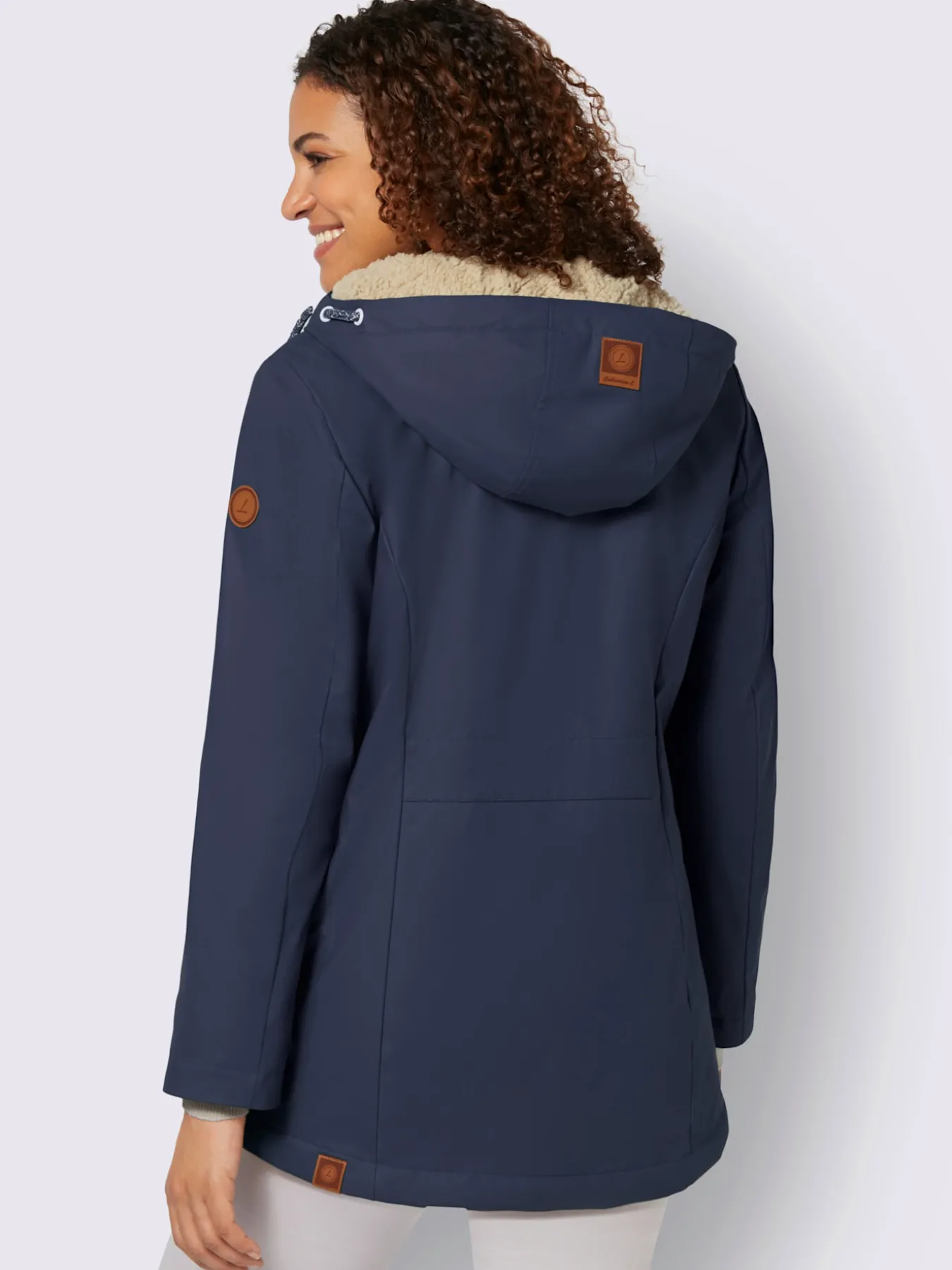 Veste capuche à coulisse et stoppeurs