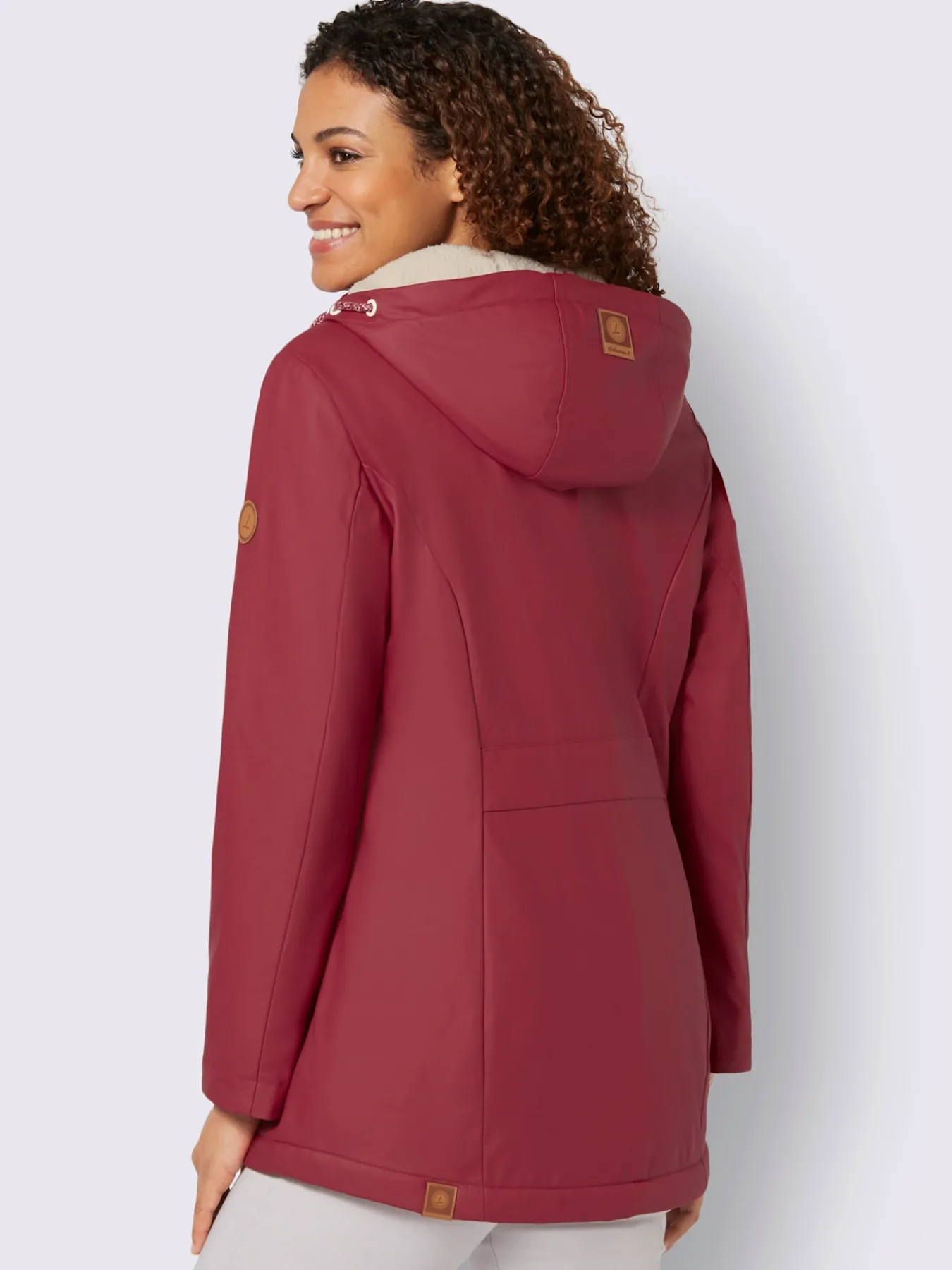Veste capuche à coulisse et stoppeurs