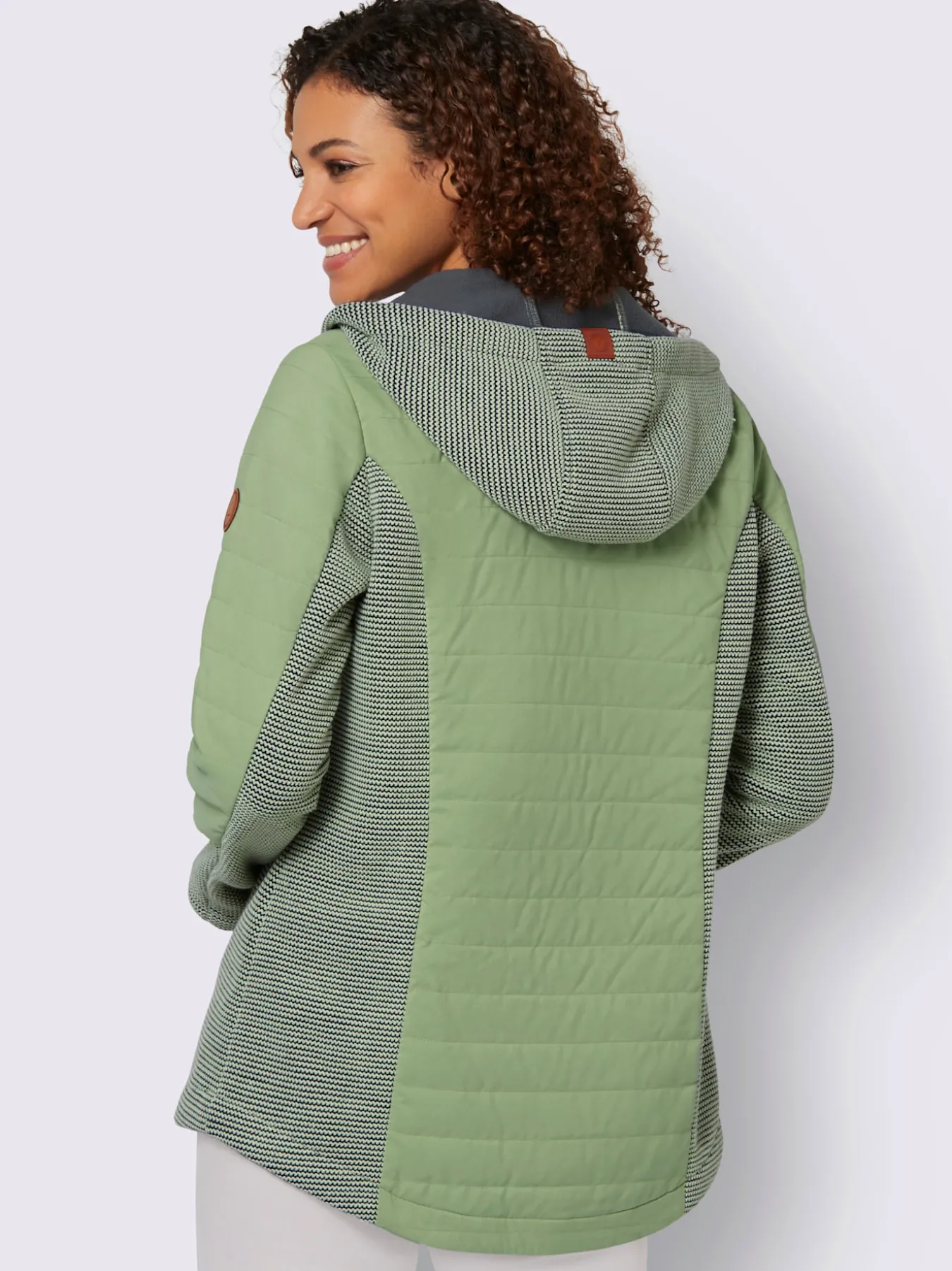Veste de mi-saison capuche à coulisse et stoppeurs