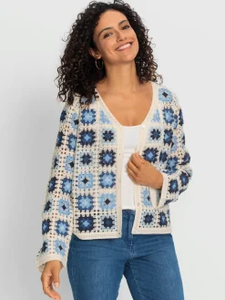 Veste en tricot aspect crochet