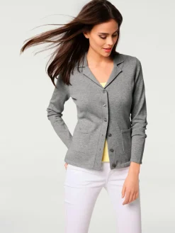 Veste en tricot fin superbe basique avec poches plaquées