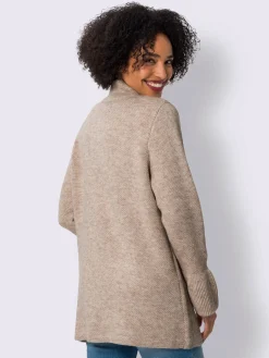 Veste en tricot manches à volants tendance