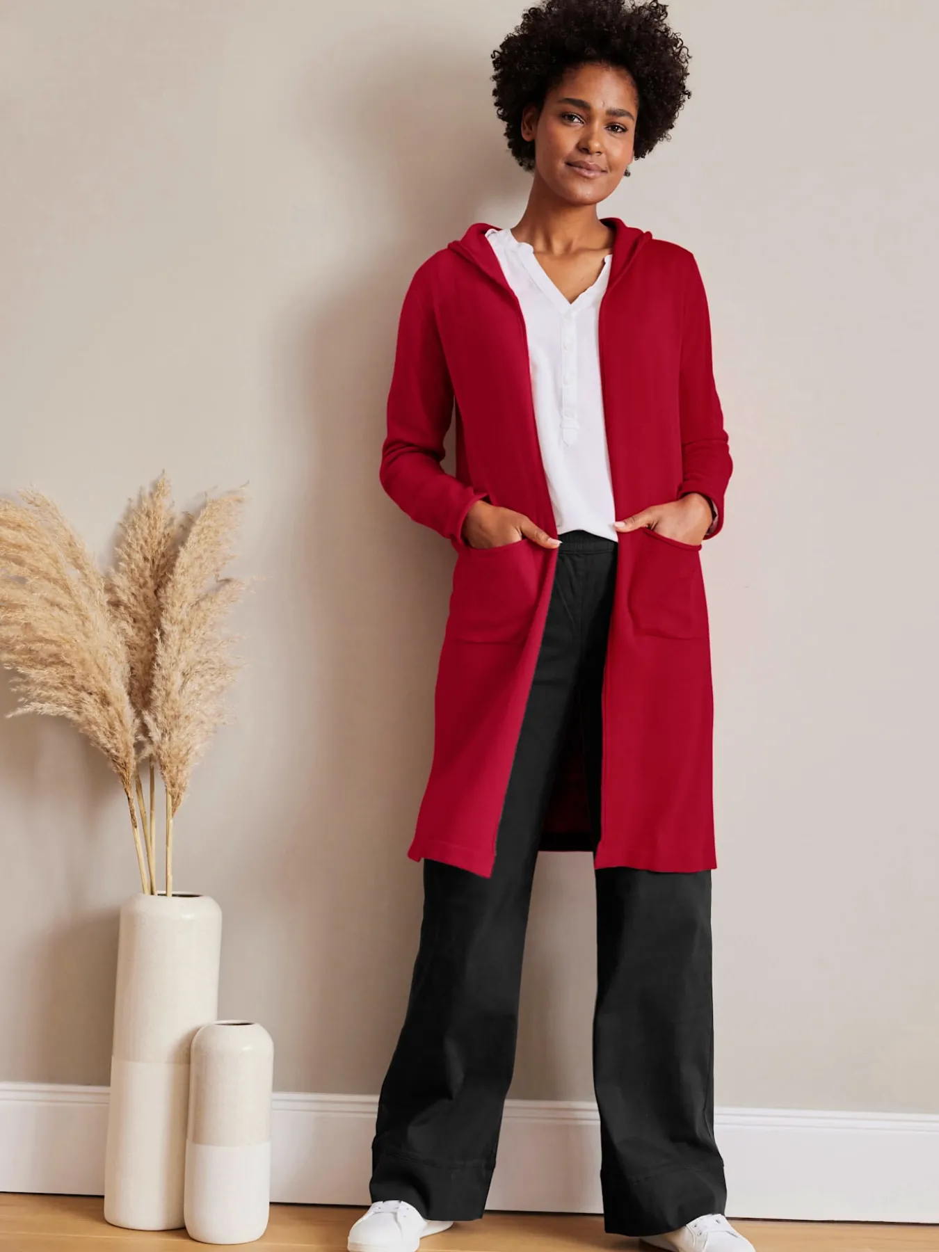 Veste longue en tricot à capuche