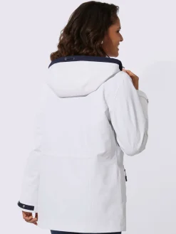 Veste technique capuche amovible grâce à une glissière
