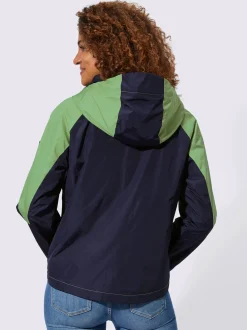 Veste technique capuche amovible grâce à une glissière