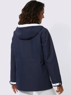 Veste technique capuche amovible grâce à une glissière